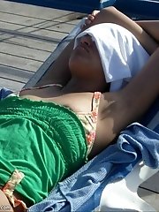 12 pictures - Tits and nipples pulling out of bikini dolls bras