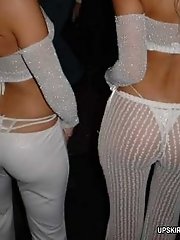 7 pictures - White panties clearly seen through babe's sheer trousers