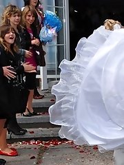 10 pictures - Naughty Brides upskirt photos