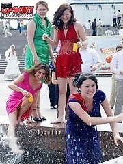 12 pictures - Cute upskirt girl in sexy red dress