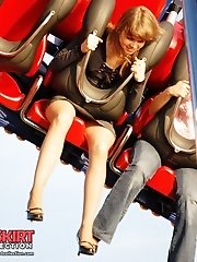 12 pictures - Cute upskirt girls in amusement park
